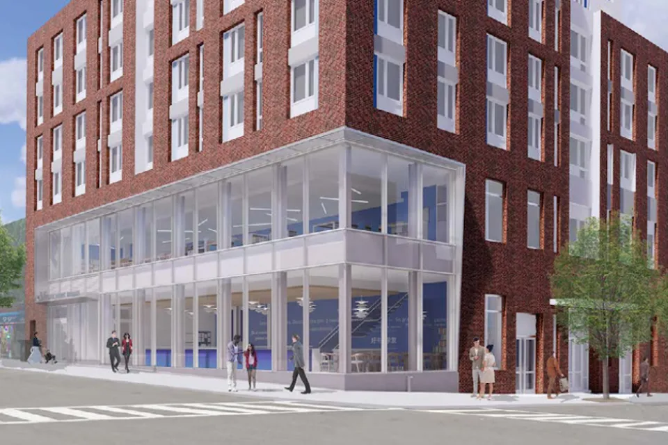 Rendering of reconstructed Sunset Park library branch in Brooklyn, NY with housing above ground-floor library branch.
